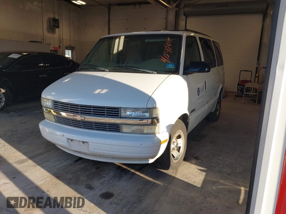 2002 Chevrolet Astro with VIN 1GNDM19X32B146063, listed as a IAAI auction lot 41595819 with 77,364 mi miles. Bid and sale history available at carsss.com. Image 2.