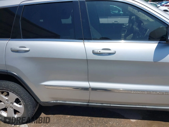 2012 Jeep Grand Cherokee Laredo with VIN 1C4RJEAG4CC167557, listed as a IAAI auction lot 42047720 with 195,631 mi miles. Bid and sale history available at carsss.com. Image 14.