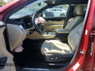 2018 Cadillac XT5 FWD with VIN 1GYKNARS1JZ205595, listed as a Copart auction lot 52428565 with 106,927 mi miles and Salvage title. Bid and sale history available at DreamBid. Image 7.