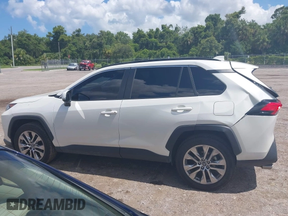 2021 Toyota RAV4 XLE Premium with VIN 2T3C1RFV0MW107651, listed as a IAAI auction lot 42558254 with 68,286 mi miles and . Bid and sale history available at DreamBid. Image 14.
