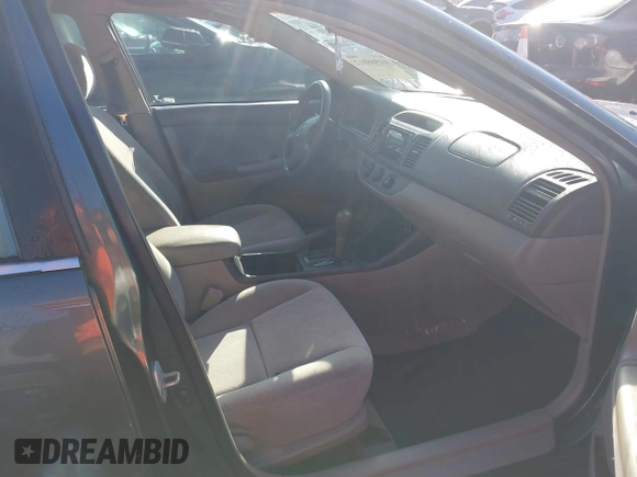 2003 Toyota Camry LE with VIN 4T1BE32KX3U689421, listed as a IAAI auction lot 41566812 with 192,673 mi miles and . Bid and sale history available at DreamBid. Image 5.