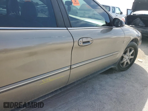 2003 Mercury Sable LS Premium z VIN 1MEFM59S03A606329, wystawiony jako Copart lot #79331624 z przebiegiem 152 059 mil mil oraz Nie do naprawy. Historia ofert i sprzedaży dostępna na DreamBid. Obrazek 12.