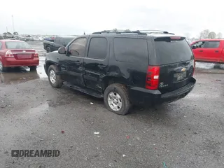 2013 Chevrolet Tahoe LS with VIN 1GNSCAE07DR223062, listed as a IAAI auction lot 41948276 with 196,616 mi miles and . Bid and sale history available at DreamBid. Image 3.
