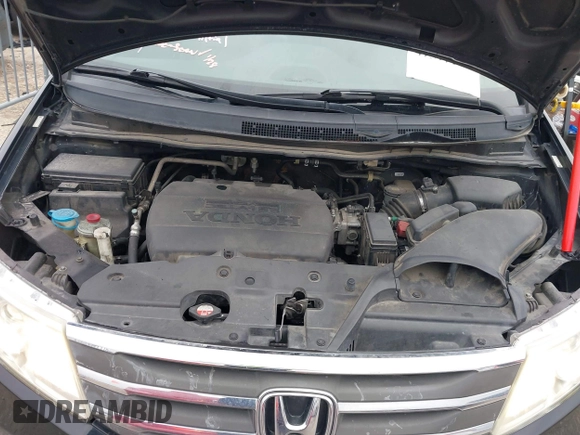 2013 Honda Odyssey Touring with VIN 5FNRL5H9XDB073706, listed as a IAAI auction lot 41591111 with 158,305 mi miles and . Bid and sale history available at carsss.com. Image 10.