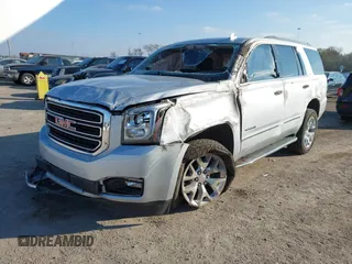 2020 GMC Yukon SLT Standard Edition with VIN 1GKS2DKCXLR294027, listed as a IAAI auction lot 41004965 with 69,161 mi miles. Bid and sale history available at carsss.com. Image 2.