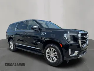 2021 GMC Yukon XL SLT z VIN 1GKS1GKD2MR174091, wystawiony jako Copart lot #59674965 z przebiegiem 216 731 mil mil oraz Czysty tytuł • Clean title. Historia ofert i sprzedaży dostępna na DreamBid. Obrazek 1.