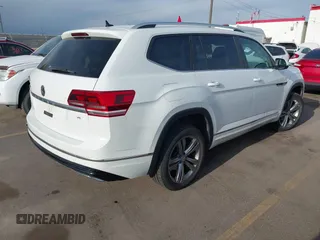 2018 Volkswagen Atlas SE z VIN 1V2FR2CA2JC540657, wystawiony jako IAAI lot #42115554 z przebiegiem 107 309 mil mil oraz . Historia ofert i sprzedaży dostępna na DreamBid. Obrazek 4.