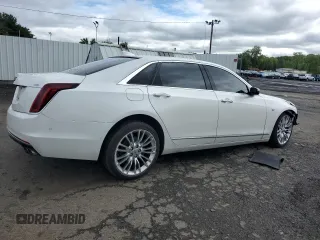 2018 Cadillac CT6 Premium Luxury AWD z VIN 1G6KG5RS0JU156753, wystawiony jako Copart lot #58171805 z przebiegiem 100 517 mil mil oraz Szkody całkowita. Historia ofert i sprzedaży dostępna na DreamBid. Obrazek 3.