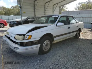 1992 Ford Taurus GL z VIN 1FALP52U5NA280821, wystawiony jako Copart lot #77457304 z przebiegiem 33 484 mil mil oraz Szkoda całkowita • Salvage title. Historia ofert i sprzedaży dostępna na DreamBid. Obrazek 1.