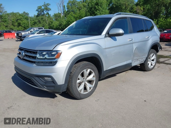 2019 Volkswagen Atlas SE with VIN 1V2UR2CA2KC557449, listed as a IAAI auction lot 42281302 with 106,739 mi miles and . Bid and sale history available at DreamBid. Image 2.
