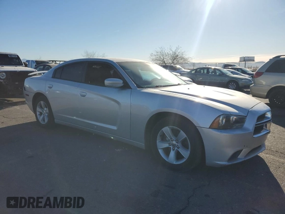 2012 Dodge Charger SE with VIN 2C3CDXBG7CH214766, listed as a Copart auction lot 42142695 with 163,208 mi miles and Salvage Title. Bid and sale history available at DreamBid. Image 4.