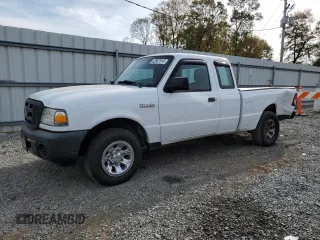 2010 Ford Ranger with VIN 1FTLR1EE1APA37032, listed as a Copart auction lot 82587614 with 215,440 mi miles and Salvage Title. Bid and sale history available at DreamBid. Image 1.