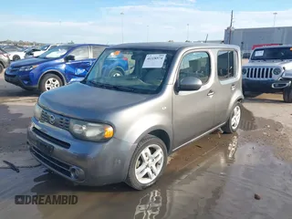 2013 Nissan Cube SL z VIN JN8AZ2KR8DT301092, wystawiony jako IAAI lot #41328574 z przebiegiem Nie podano mil oraz . Historia ofert i sprzedaży dostępna na DreamBid. Obrazek 19.