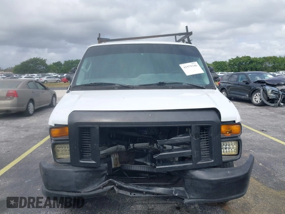 2013 Ford Econoline Cargo Commercial with VIN 1FTNE2EW6DDA10949, listed as a IAAI auction lot 41979346 with 250,952 mi miles and . Bid and sale history available at DreamBid. Image 12.