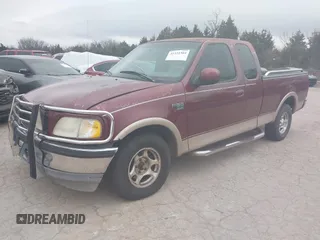 1998 Ford F-150 XL with VIN 1FTRX17L9WKA93669, listed as a IAAI auction lot 41531304 with 174,614 mi miles and . Bid and sale history available at DreamBid. Image 2.