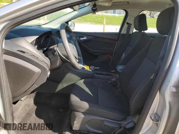 2017 Ford Focus SE z VIN 1FADP3F29HL339332, wystawiony jako Copart lot #56556735 z przebiegiem 93 050 mil mil oraz Szkoda całkowita • Salvage title. Historia ofert i sprzedaży dostępna na DreamBid. Obrazek 7.