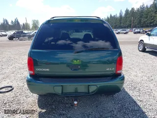 1999 Dodge Durango with VIN 1B4HS28Z3XF521133, listed as a IAAI auction lot 42068475 with 229,651 mi miles. Bid and sale history available at carsss.com. Image 16.