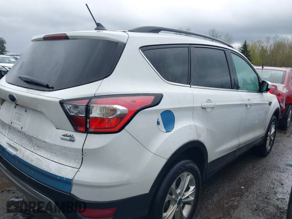 2018 Ford Escape SEL with VIN 1FMCU9HD5JUA42764, listed as a IAAI auction lot 41869026 with 84,958 mi miles. Bid and sale history available at carsss.com. Image 4.