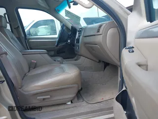 2004 Mercury Mountaineer Convenience z VIN 4M2ZU66K64UJ18540, wystawiony jako IAAI lot #42333221 z przebiegiem 200 768 mil mil oraz . Historia ofert i sprzedaży dostępna na DreamBid. Obrazek 5.