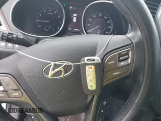 2018 Hyundai Santa Fe 2.0T z VIN 5XYZU4LA9JG537310, wystawiony jako IAAI lot #42393689 z przebiegiem Nie podano mil oraz . Historia ofert i sprzedaży dostępna na DreamBid. Obrazek 11.