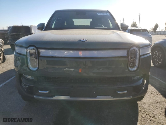 2022 Rivian R1T Launch Edition with VIN 7FCTGAAL3NN003101, listed as a Copart auction lot 85602634 with 17,189 mi miles and Salvage Title. Bid and sale history available at carsss.com. Image 5.