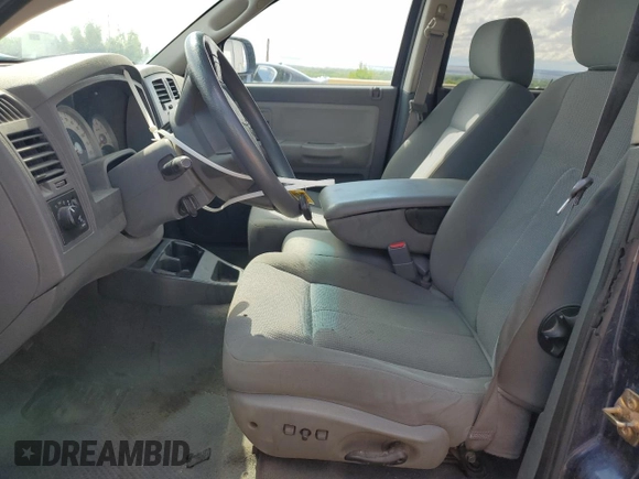 2006 Dodge Dakota SLT z VIN 1D7HW48K26S704816, wystawiony jako Copart lot #56071985 z przebiegiem 105 189 mil mil oraz Szkoda całkowita • Salvage title. Historia ofert i sprzedaży dostępna na DreamBid. Obrazek 7.