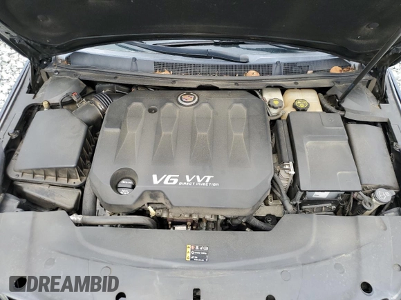 2013 Cadillac XTS Premium z VIN 2G61S5S37D9169935, wystawiony jako Copart lot #57515415 z przebiegiem 122 144 mil mil oraz Szkoda całkowita • Salvage title. Historia ofert i sprzedaży dostępna na DreamBid. Obrazek 11.