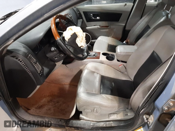 2007 Cadillac CTS with VIN 1G6DP577570161597, listed as a Copart auction lot 73445572 with 143,362 mi miles and Salvage Title. Bid and sale history available at carsss.com. Image 7.
