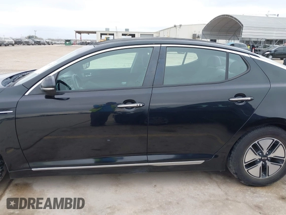 2012 Kia Optima Hybrid with VIN KNAGM4AD8C5021615, listed as a IAAI auction lot 41216697 with 119,153 mi miles. Bid and sale history available at carsss.com. Image 15.