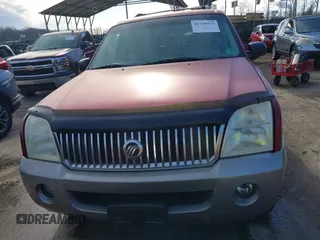2002 Mercury Mountaineer Convenience z VIN 4M2ZU86W12ZJ16791, wystawiony jako IAAI lot #41749193 z przebiegiem 167 878 mil mil oraz . Historia ofert i sprzedaży dostępna na DreamBid. Obrazek 12.
