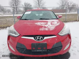 2014 Hyundai Veloster with VIN KMHTC6AD8EU214612, listed as a IAAI auction lot 41258820 with 61,984 mi miles. Bid and sale history available at carsss.com. Image 12.