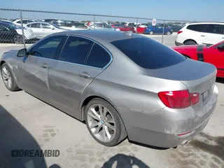 2015 BMW 5 Series 535i with VIN WBA5B1C56FG125286, listed as a IAAI auction lot 41747088 with 136,970 mi miles and . Bid and sale history available at carsss.com. Image 3.