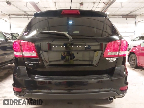 2015 Dodge Journey SXT with VIN 3C4PDDBG5FT518699, listed as a IAAI auction lot 41887477 with 118,966 mi miles and . Bid and sale history available at DreamBid. Image 16.
