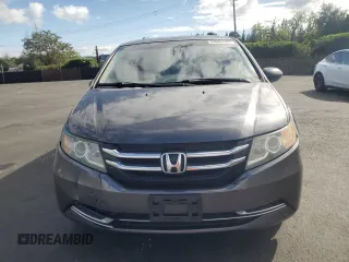 2015 Honda Odyssey LX with VIN 5FNRL5H27FB018491, listed as a Copart auction lot 54888445 with 129,488 mi miles and Salvage Title. Bid and sale history available at DreamBid. Image 5.