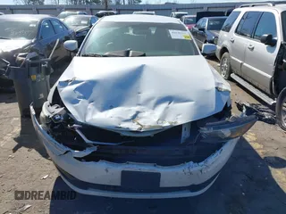2012 Kia Optima EX with VIN 5XXGN4A70CG028435, listed as a IAAI auction lot 41640394 with 153,000 mi miles. Bid and sale history available at carsss.com. Image 12.
