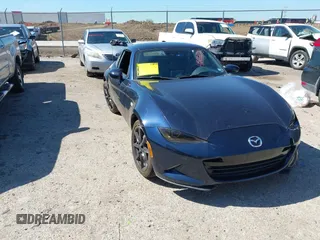 2021 Mazda MX-5 Miata Grand Touring with VIN JM1NDAM7XM0455743, listed as a IAAI auction lot 42067373 with 28,255 mi miles and . Bid and sale history available at DreamBid. Image 1.