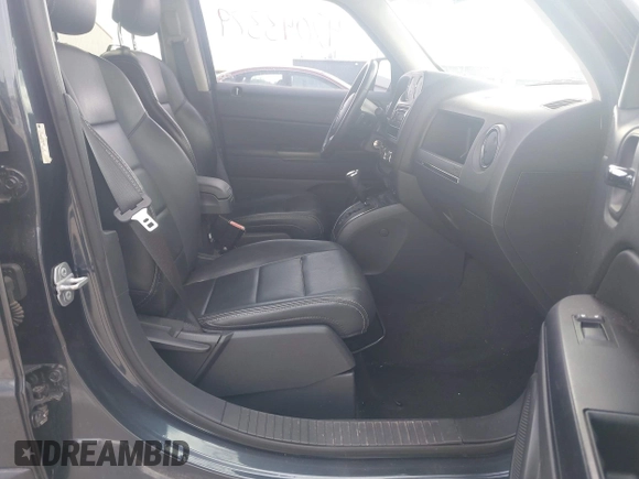 2015 Jeep Patriot High Altitude with VIN 1C4NJRFBXFD145130, listed as a IAAI auction lot 42043379 with 82,420 mi miles and . Bid and sale history available at carsss.com. Image 5.