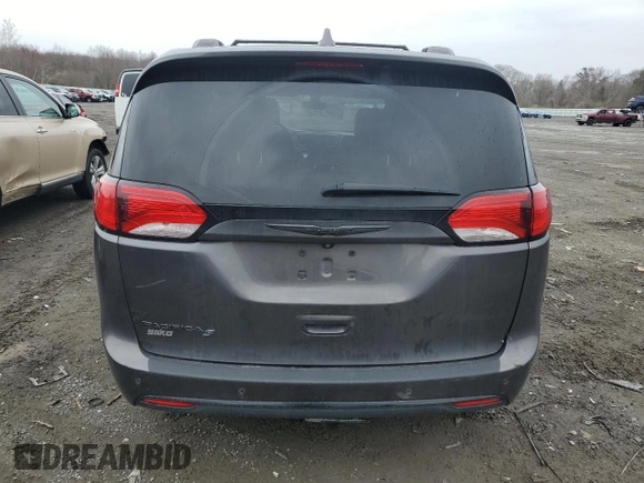 2018 Chrysler Pacifica Touring L with VIN 2C4RC1BG7JR175156, listed as a Copart auction lot 52935435 with 106,264 mi miles and Salvage Title. Bid and sale history available at DreamBid. Image 6.