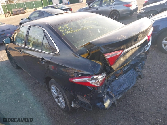 2015 Toyota Camry Hybrid LE with VIN 4T1BD1FK0FU163708, listed as a IAAI auction lot 41766167 with 999,999 mi miles. Bid and sale history available at carsss.com. Image 3.