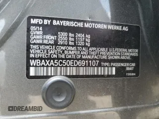 2014 BMW 5 Series 535d with VIN WBAXA5C50ED691107, listed as a Copart auction lot 64393794 with 114,627 mi miles and Salvage Title. Bid and sale history available at DreamBid. Image 14.