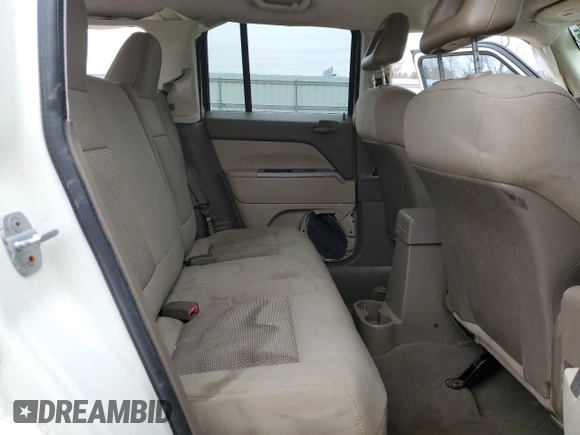 2007 Jeep Patriot Sport with VIN 1J8FT28W77D359282, listed as a Copart auction lot 44372385 with 194,152 mi miles and Salvage Title. Bid and sale history available at DreamBid. Image 12.
