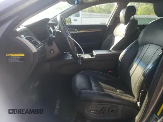 2015 Hyundai Genesis 3.8L with VIN KMHGN4JE0FU071228, listed as a Copart auction lot 52076305 with 34,557 mi miles and Salvage Title. Bid and sale history available at DreamBid. Image 7.