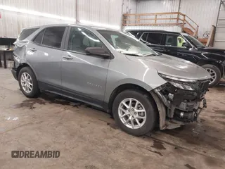 2023 Chevrolet Equinox LS z VIN 3GNAXSEG7PL216367, wystawiony jako IAAI lot #41399198 z przebiegiem 18 509 mil mil oraz . Historia ofert i sprzedaży dostępna na DreamBid. Obrazek 1.