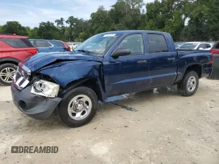 2006 Dodge Dakota ST with VIN 1D7HE28K16S505201, listed as a Copart auction lot 70400104 with 112,803 mi miles and Salvage Title. Bid and sale history available at carsss.com. Image 1.