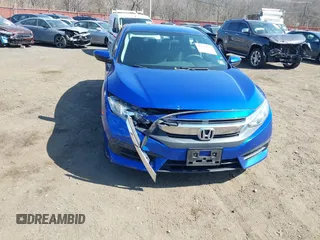 2017 Honda Civic LX z VIN 19XFC2F54HE203525, wystawiony jako IAAI lot #41796081 z przebiegiem 82 910 mil mil oraz . Historia ofert i sprzedaży dostępna na DreamBid. Obrazek 6.