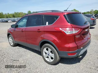 2014 Ford Escape SE z VIN 1FMCU9GX6EUD35235, wystawiony jako Copart lot #54877015 z przebiegiem 163 702 mil mil oraz Szkoda całkowita • Salvage title. Historia ofert i sprzedaży dostępna na DreamBid. Obrazek 2.