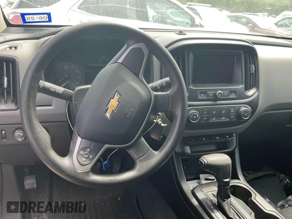 2020 Chevrolet Colorado 4WD Work Truck z VIN 1GCGTBEN8L1146859, wystawiony jako IAAI lot #42561237 z przebiegiem 96 384 mil mil oraz . Historia ofert i sprzedaży dostępna na DreamBid. Obrazek 16.