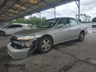 1999 Honda Accord EX with VIN 1HGCG6671XA023597, listed as a Copart auction lot 59007475 with 222,393 mi miles and Salvage title. Bid and sale history available at DreamBid. Image 1.
