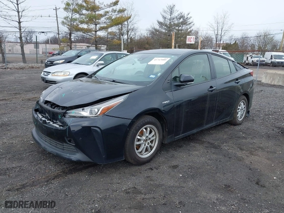 2022 Toyota Prius L Eco with VIN JTDKAMFUXN3174204, listed as a IAAI auction lot 41747089 with 79,531 mi miles. Bid and sale history available at carsss.com. Image 2.