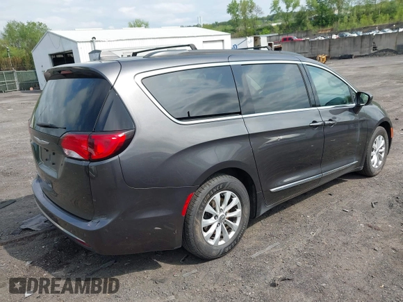 2017 Chrysler Pacifica Touring L with VIN 2C4RC1BG5HR705277, listed as a IAAI auction lot 42230036 with 75,287 mi miles and . Bid and sale history available at DreamBid. Image 4.